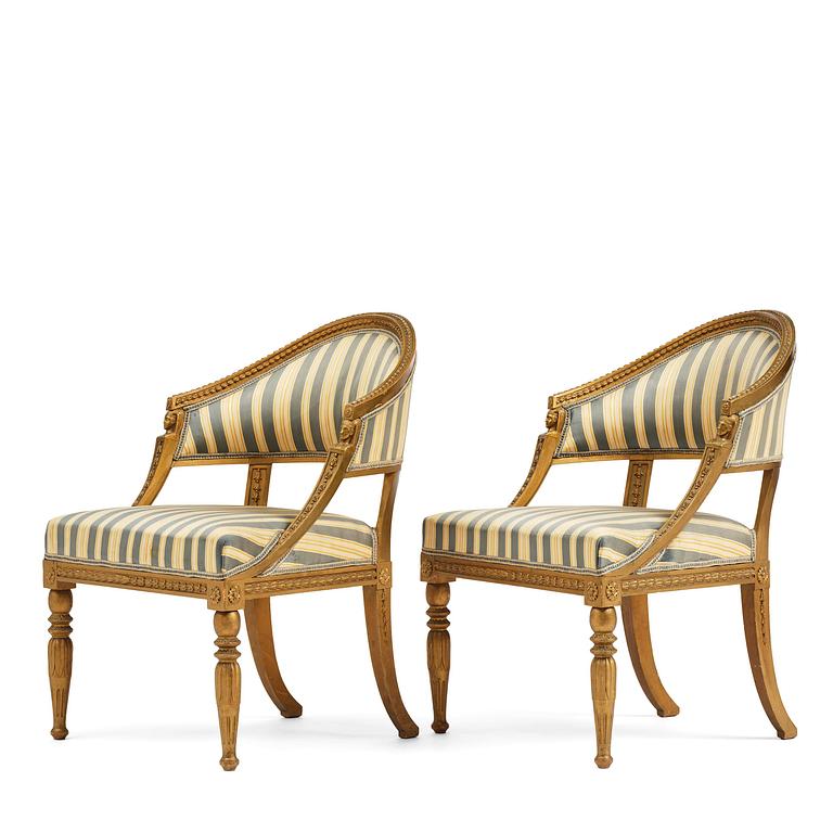 A pair of late Gustavian open armchairs attributed to E. Ståhl (master in Stockholm 1794-1820).