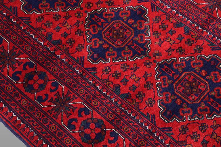 A Afghan runner carpet, 280 x 92 cm.