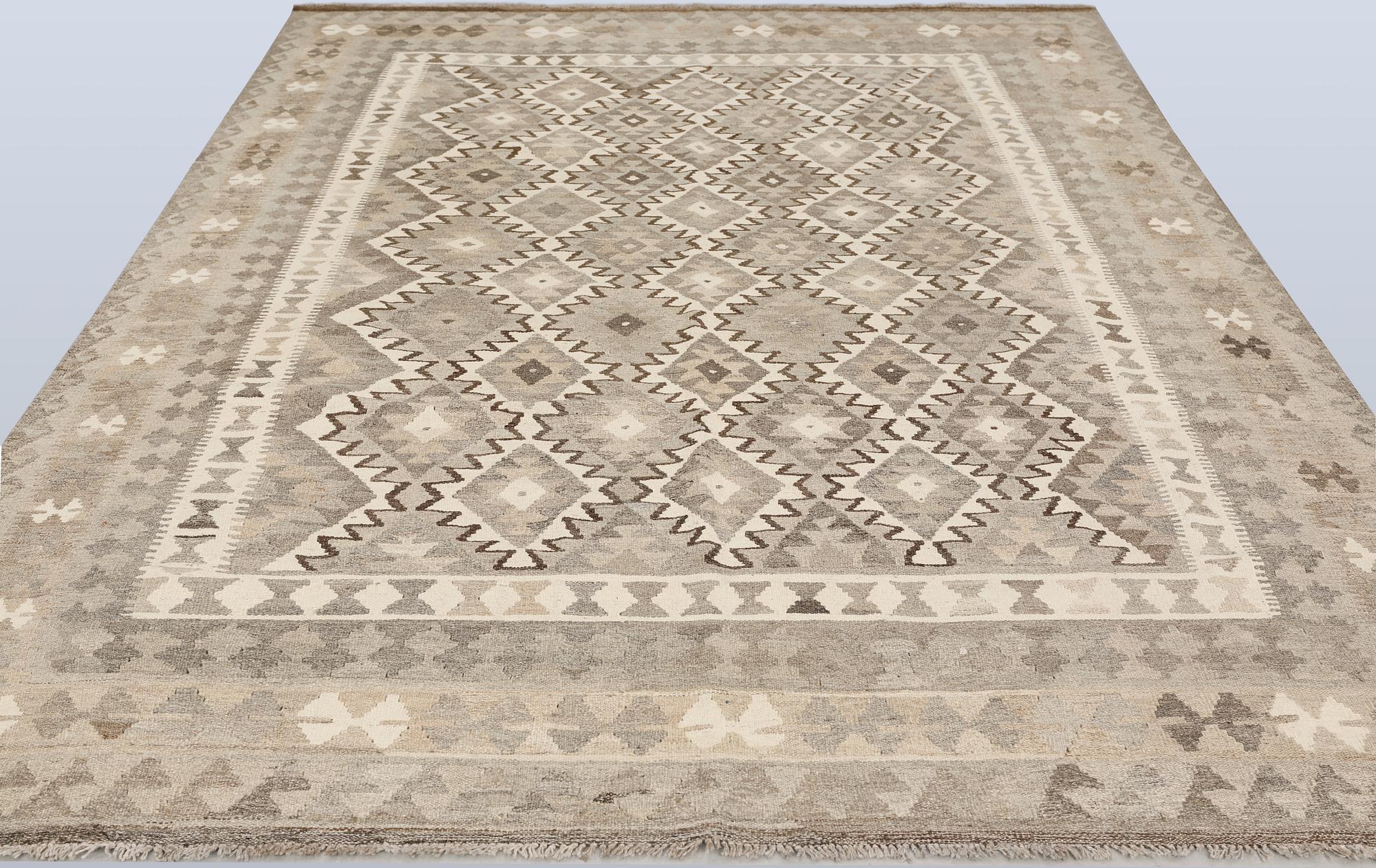 A Kilim rug, approx. 297 x 201 cm.