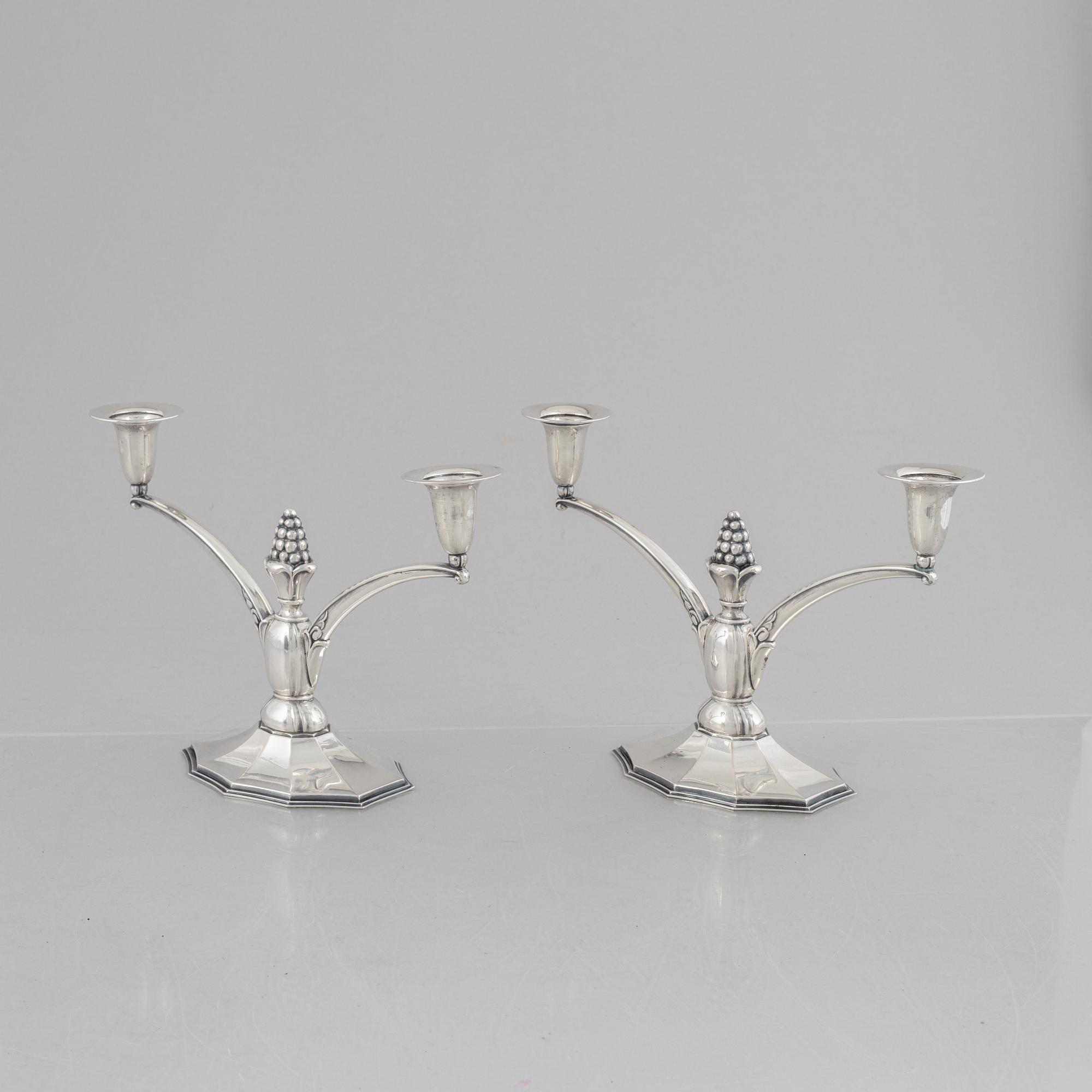 A pair of silver candelabra, Swedish import marks, probably 1920's/30's.