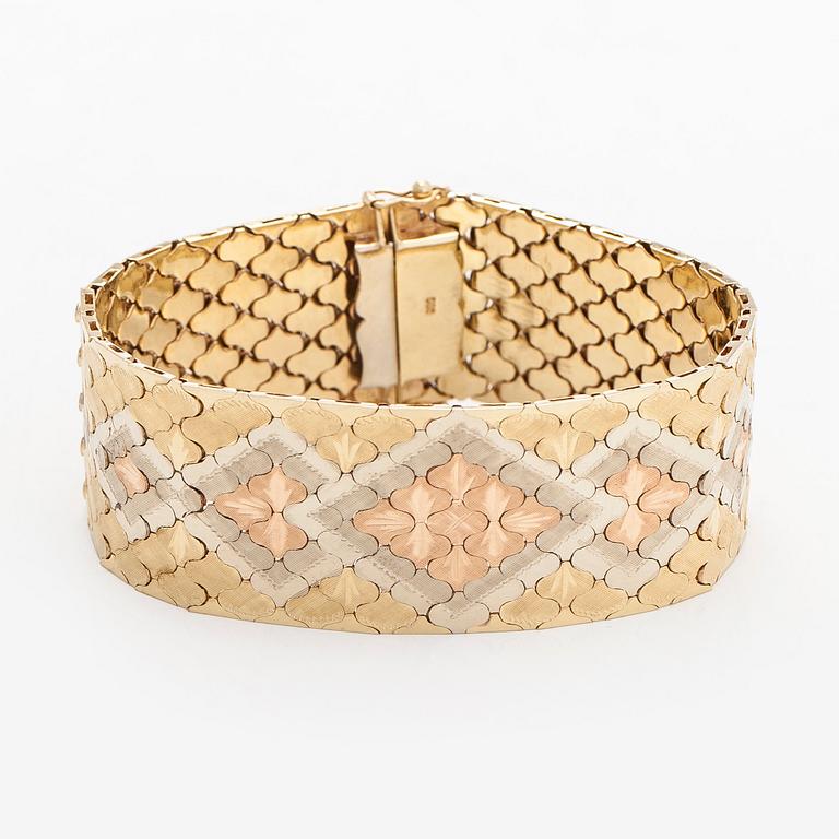 Armband i 14K trefärgsguld.