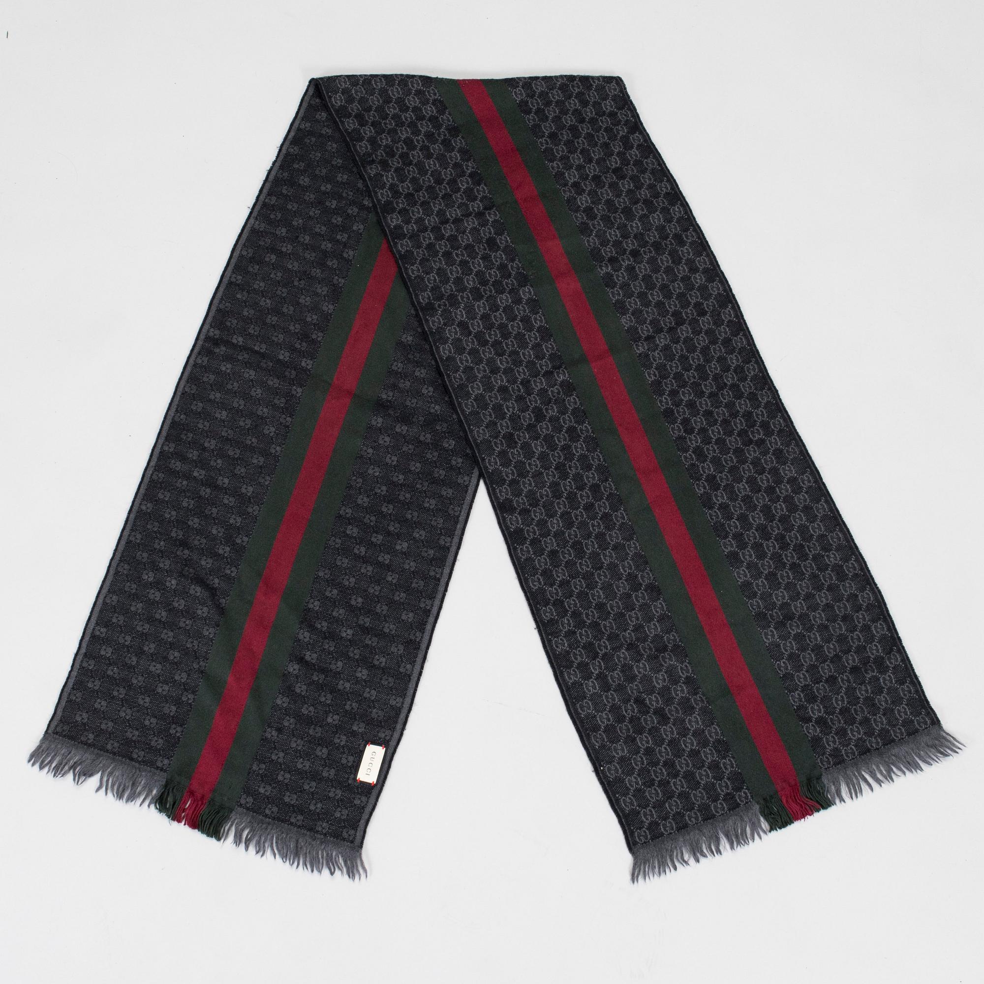 Gucci, A 'Verbier' scarf and a belt.