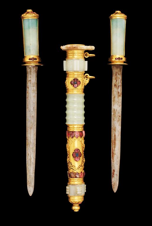A gilt jade-mounted ceremonial double sword and scabbard with inlaid 'Gems', Qing dynasty.