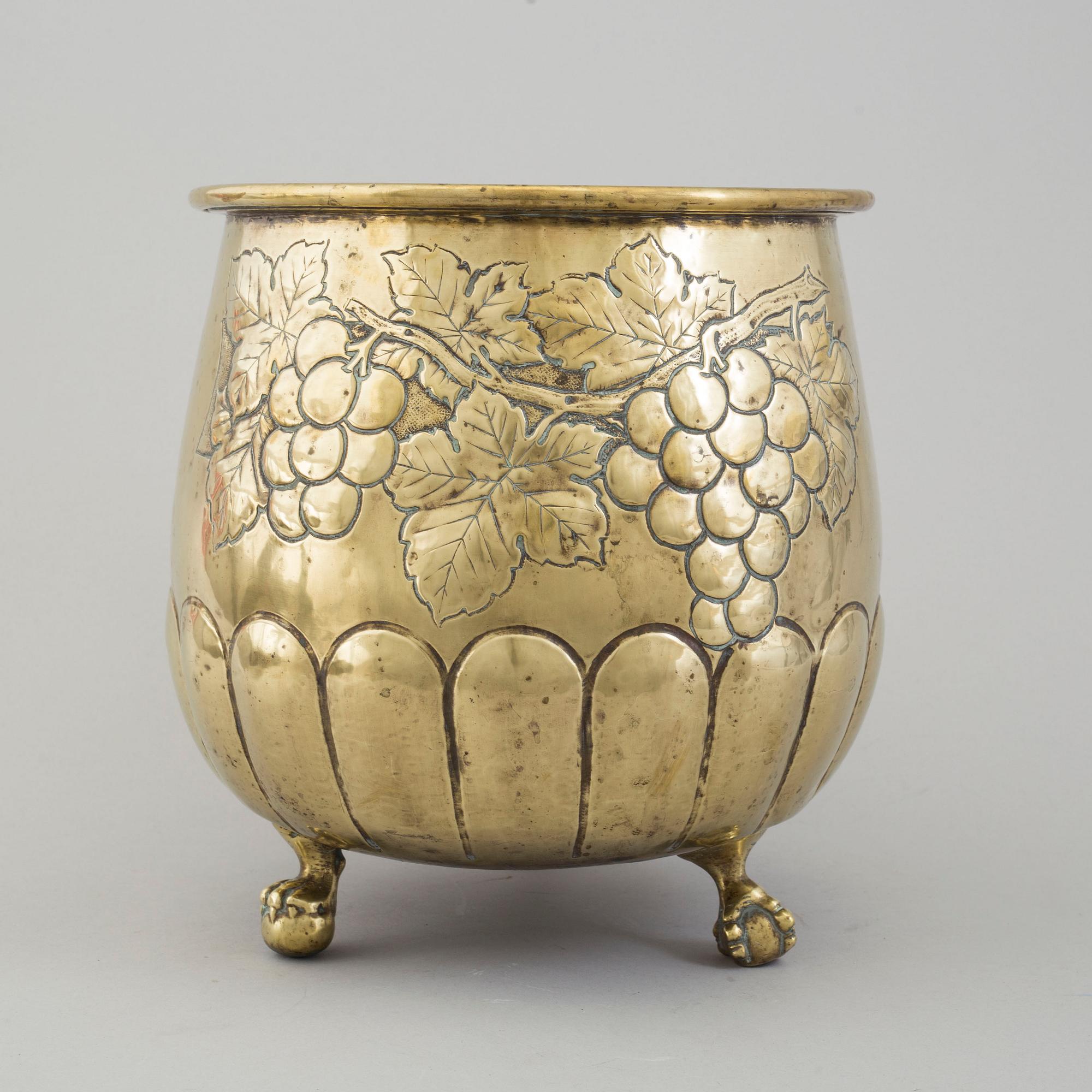 A 19th century brass flower pot.