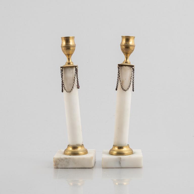 A pair of candlesticks, Gustavians style, 19th century.