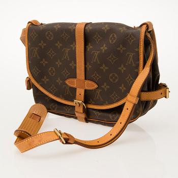 LOUIS VUITTON, Monogram Canvas Saumur Bag.