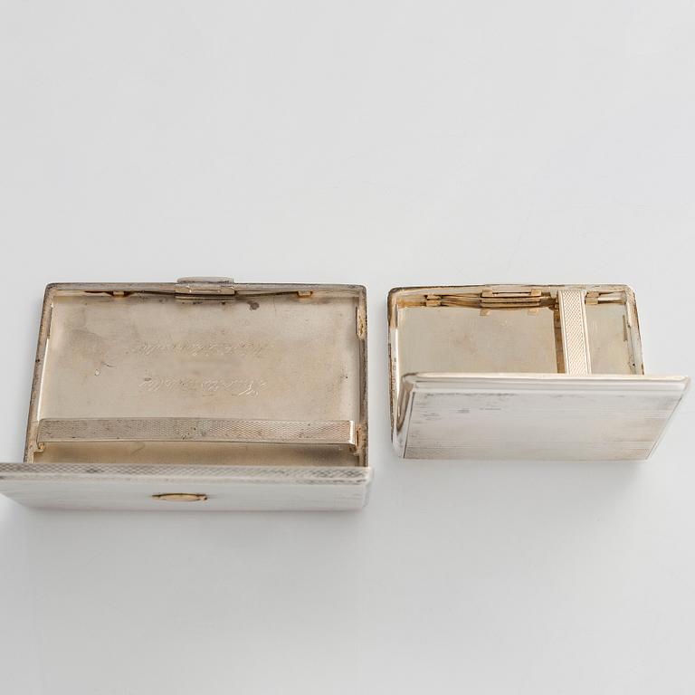 Two silver cigarette cases and a box, Belgium and Finland.