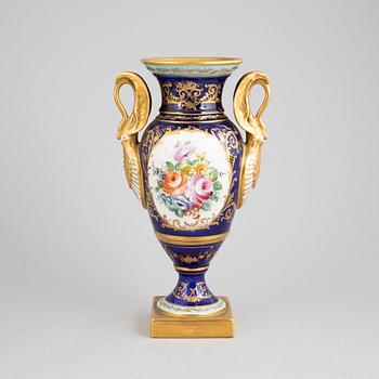 An Empire style porcelain urn decorated by Atelier Le Tallec, France, mid 20th century.