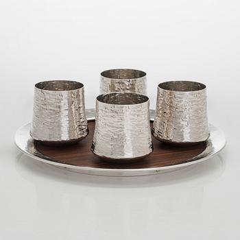 Tapio Wirkkala, four silver beakers, and a rosewood and sterling silver tray, Kultakeskus, Hämeenlinna 1973-74.
