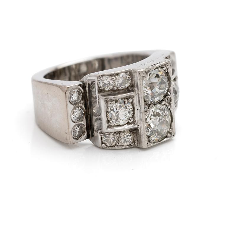 18K white gold ring with diamonds.