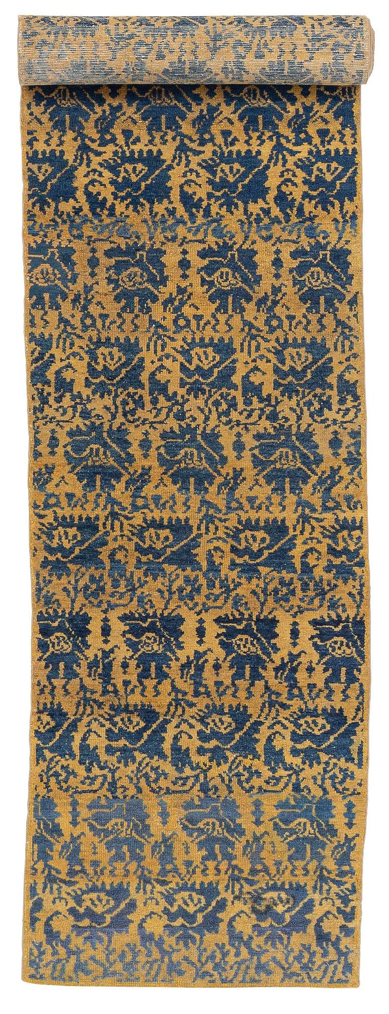 An antique Hamadan runner, Northwest Persia (Iran), c. 407 x 65 cm.