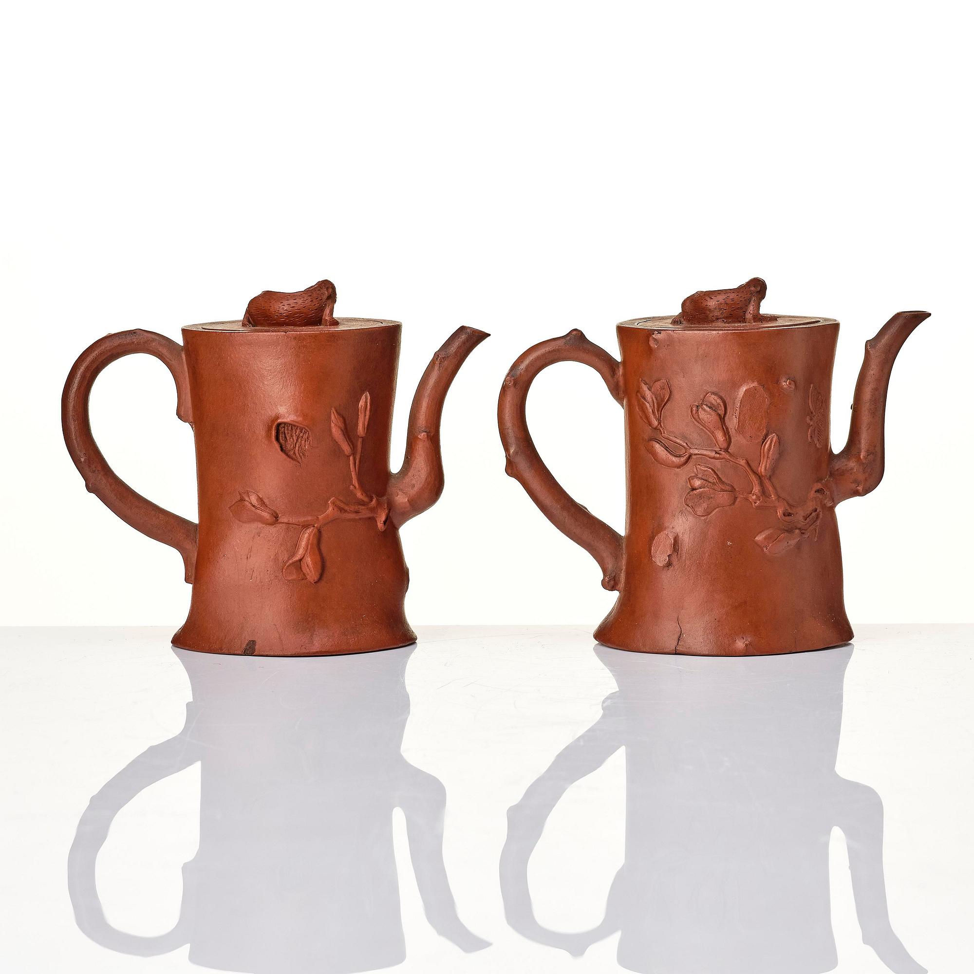 A pair of yixing teapots, Qing dynasty.