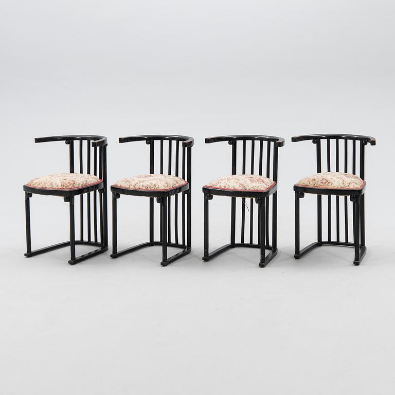 A set of four armchairs by Mundus, first half of the 20th century.