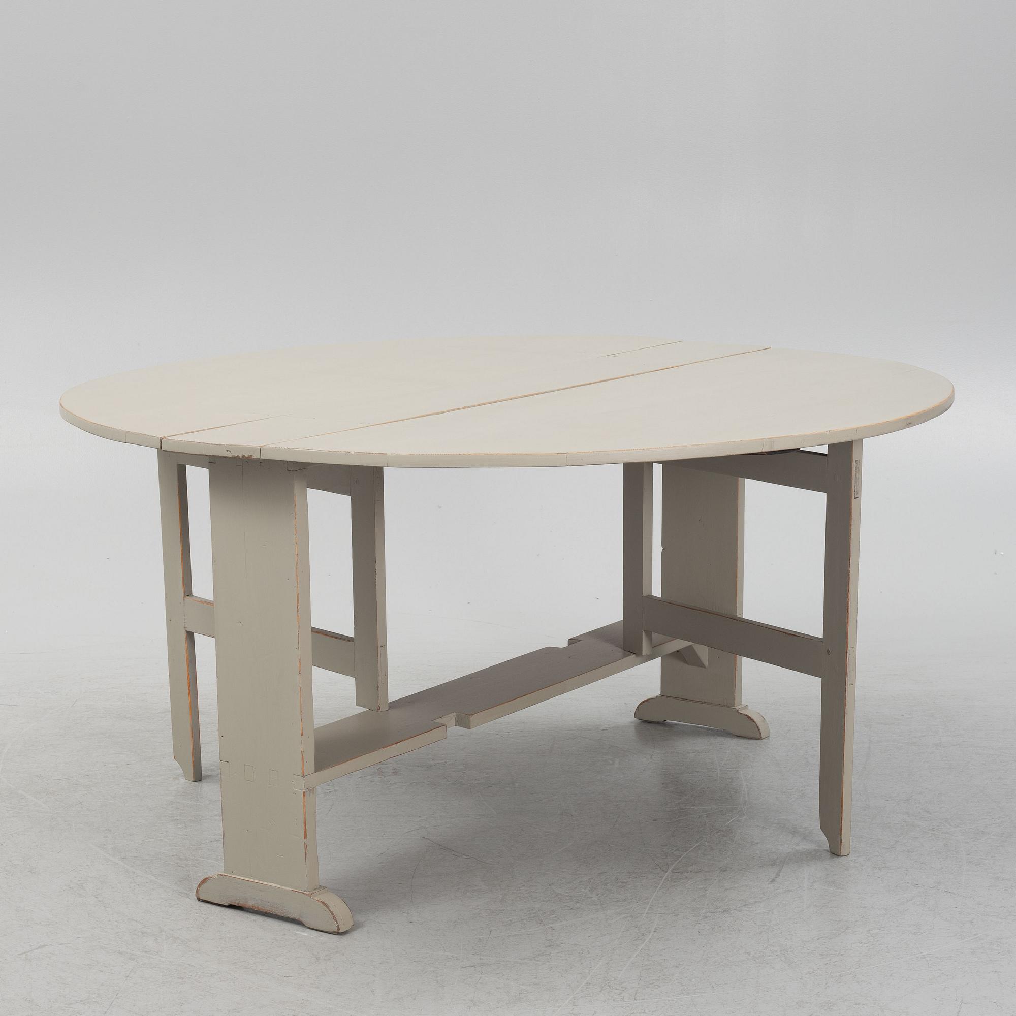 A painted gate-leg table, 19th Century.
