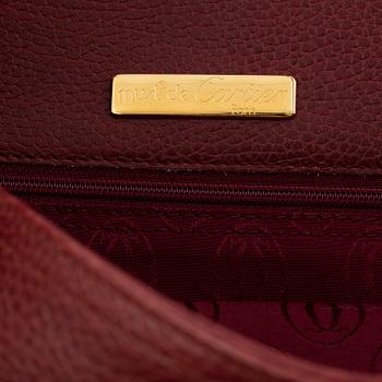 Cartier, a handbag.