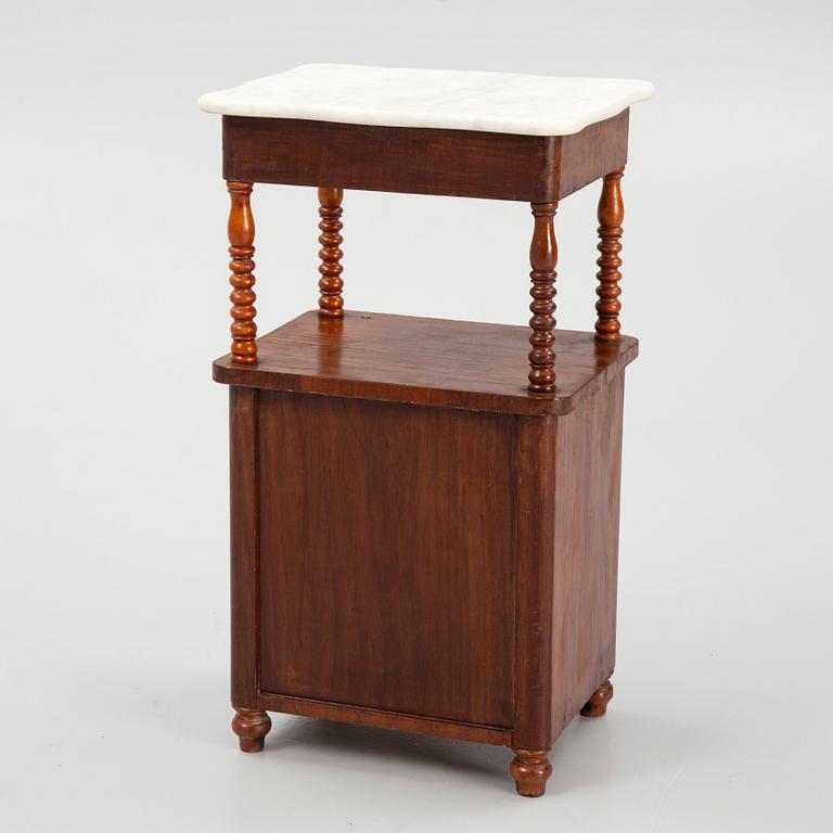 An early 20th century bedside table.