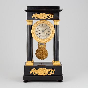 A mid 19th Century mantel clock.