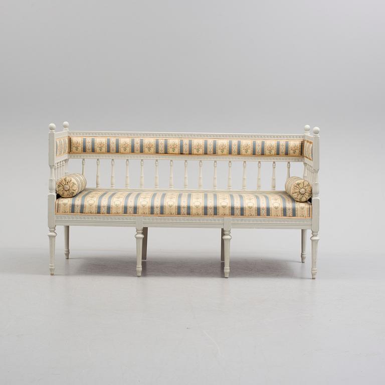 A GUSTAVIAN STYLE SETTEE, fist half of the 20th century.