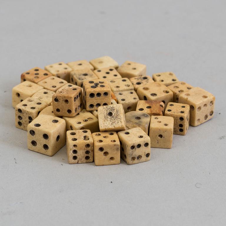 36 MINIATURE BONE DICE, 19th century.