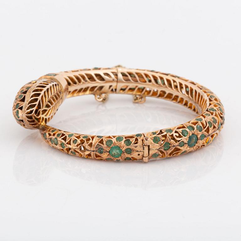 Armring,  i form av orm 14K guld med smaragder.