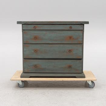 A combined chest of drawers and table, 19th century.