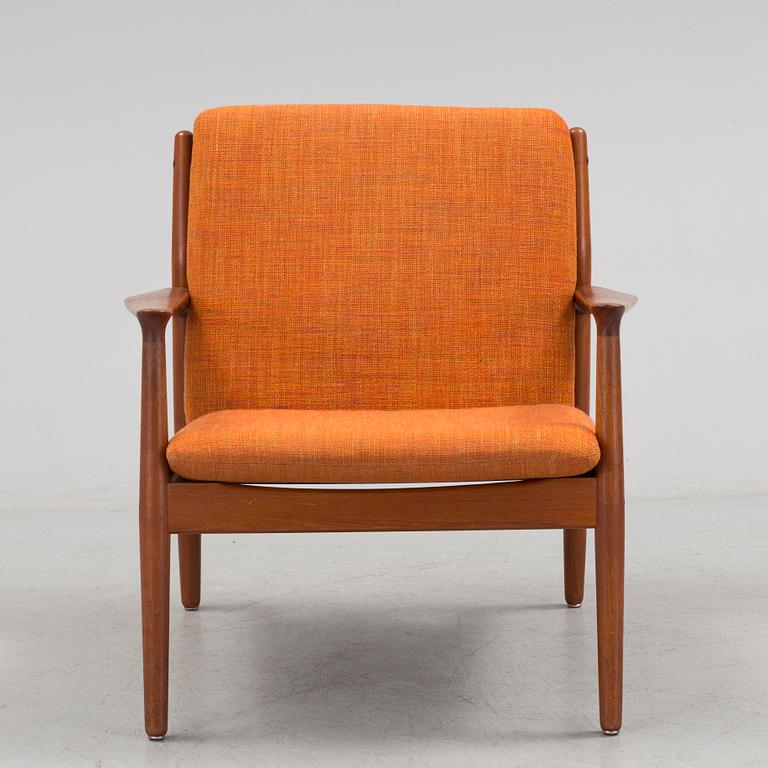 A 1960s teak Grete Jalk armchair from Glostrup, Denmark.