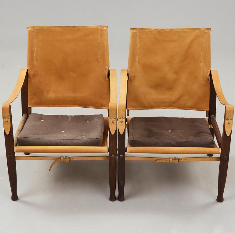 a pair of 'Safari' oak and leather armchairs, Rud. Rasmussen, Denmark, probably 1950's.