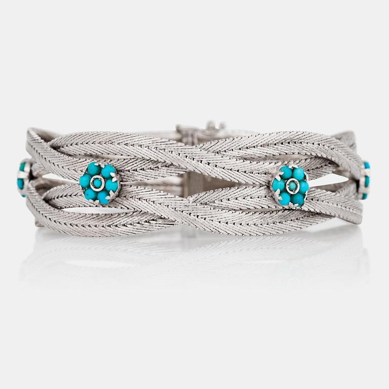 A turquoise and white gold bracelet.