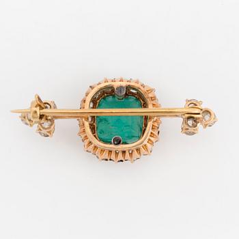 A BROOCH.