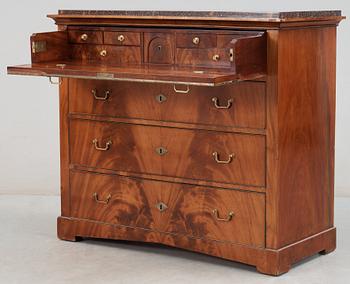 A Swedish Empire 19th century writing commode with porphyry top.