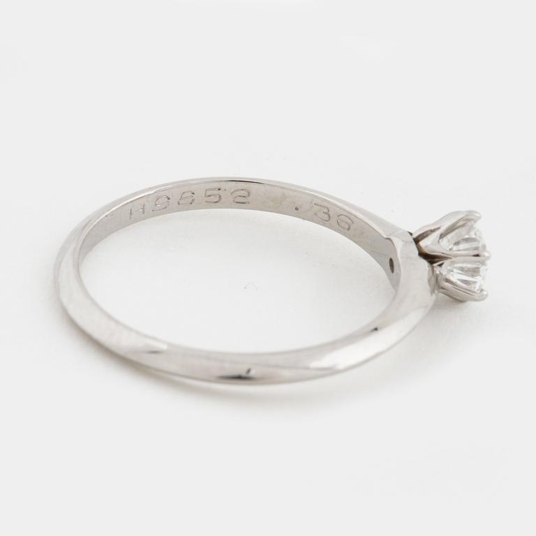 A brilliant cut diamond ring by Tiffany & Co.