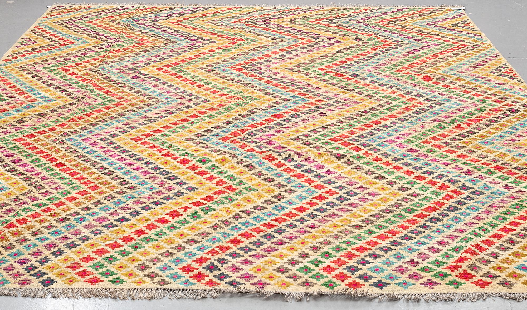 A CARPET, kilim, 397 x 287 cm.