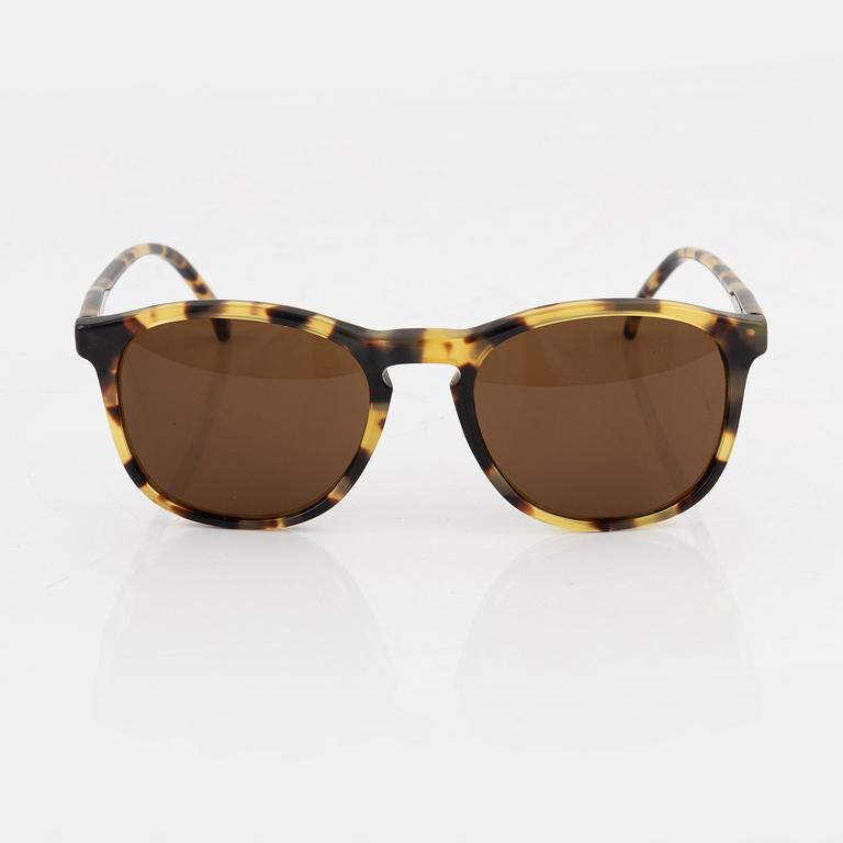 Illesteva, a pair of tortoise sunglasses.