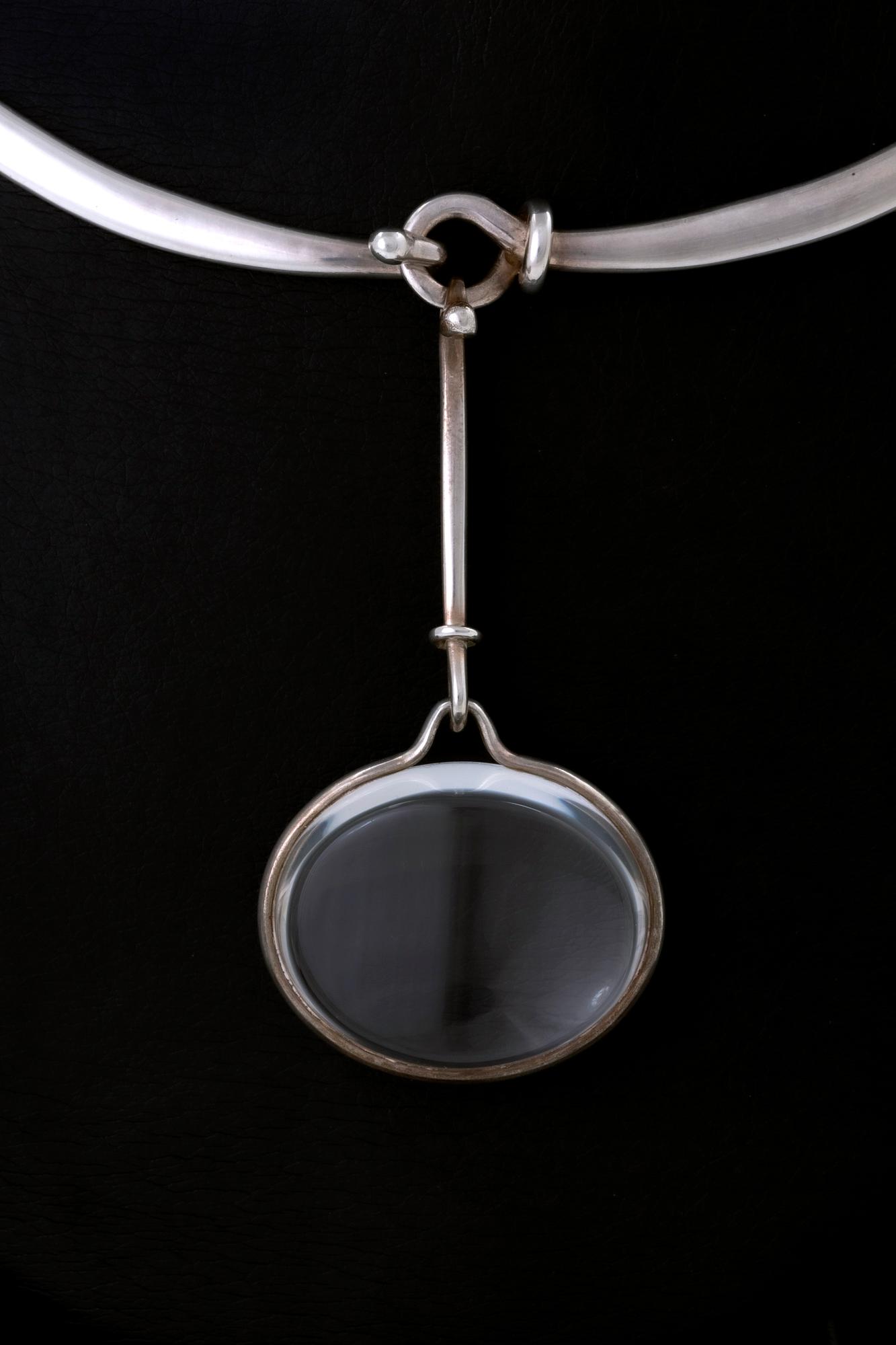 Vivianna Torun Bülow-Hübe. Necklace with pendant, sterling silver and rock crystal or glass.