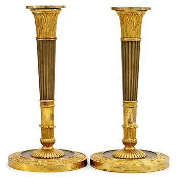 964. A pair of Empire candlesticks.