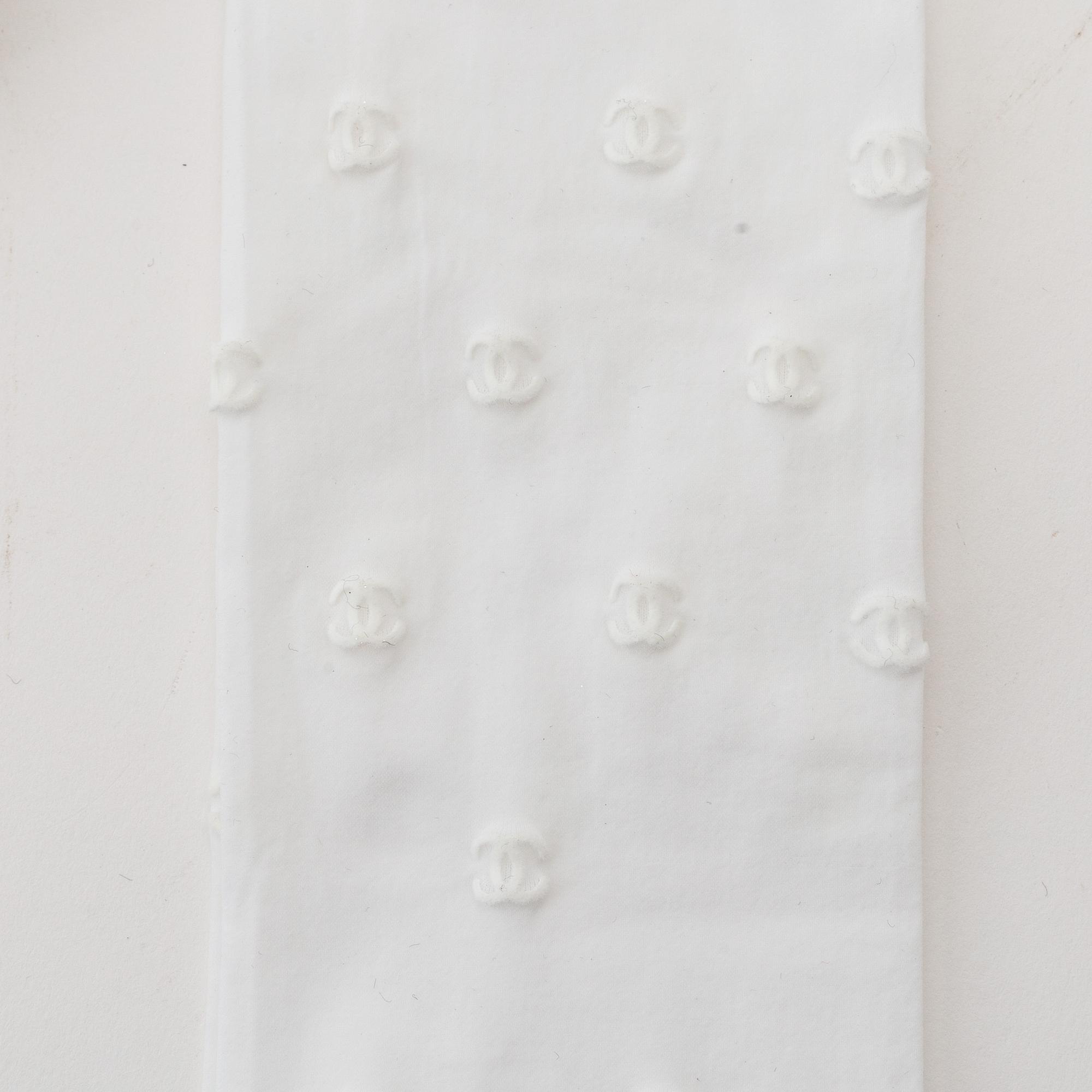 Chanel, 3 pairs of tights, size S.