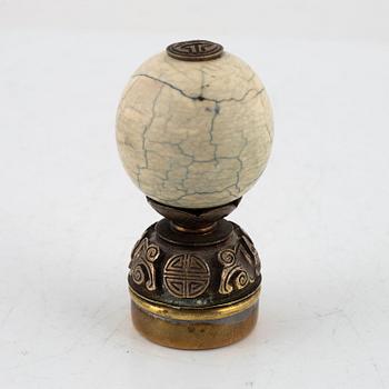 A Chinese hat finial / mandarin insignia, late Qing dynasty, 19th century.
