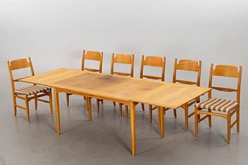 A CARL MALMSTEN DINING TABLE and CHAIRS, 7 parts.