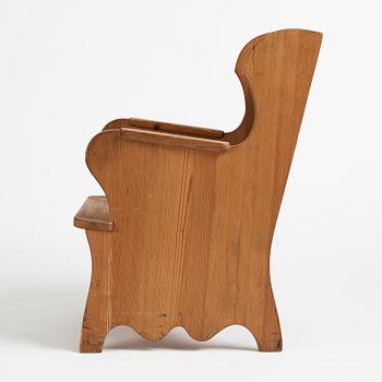 Axel Einar Hjorth, probably, a stained pine "Lovö" armchair, Nordiska Kompaniet, Sweden.