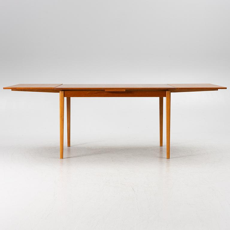 A dining table, teak, 1960s.