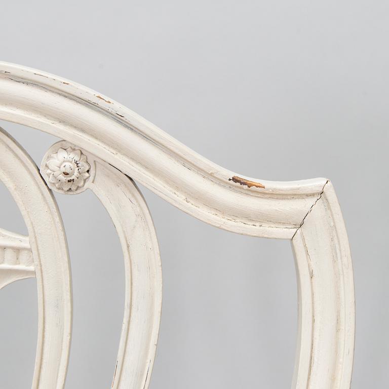Four George III style chairs, early 20th century.