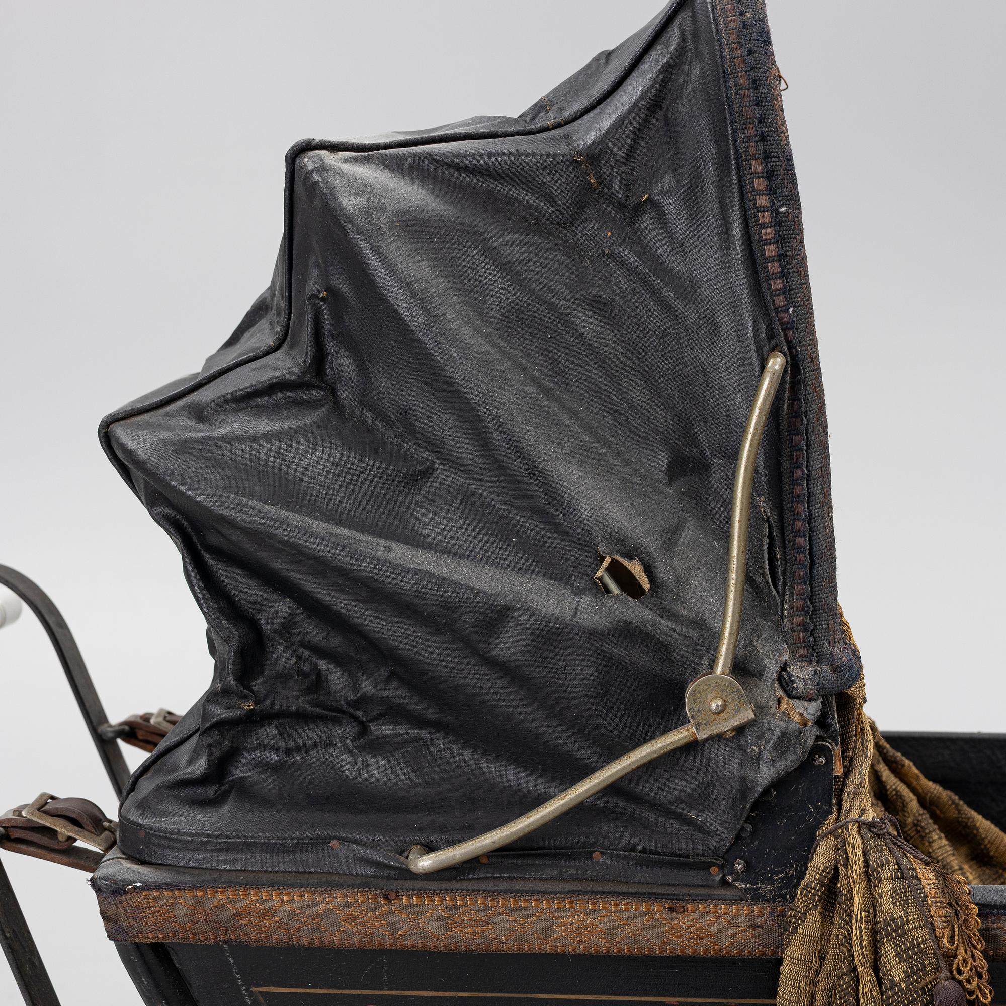 Doll's pram, first half of the 20th century.
