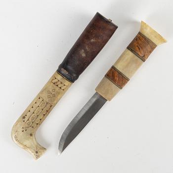 A rendeer horn knife and two spoons, unidentified signature AB.