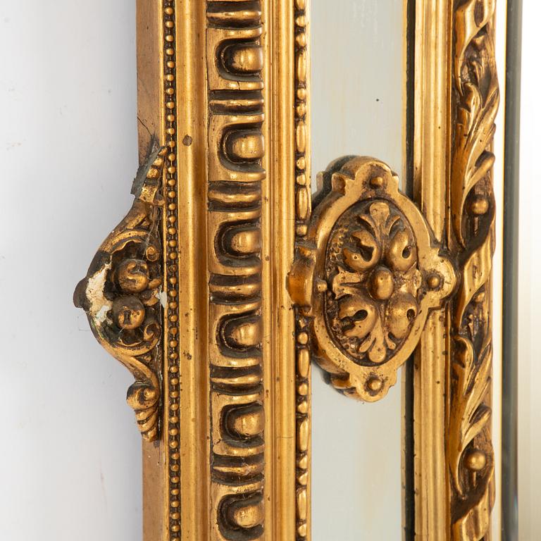 A Baroque style mirror, circa 1900.