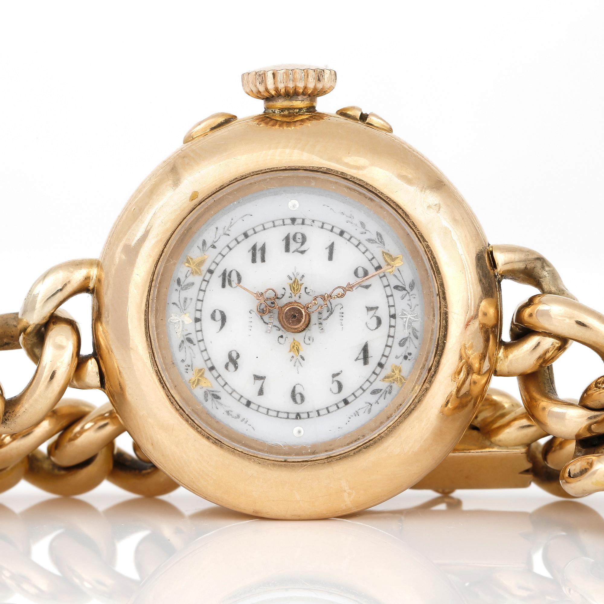 ARMBANDSUR, dam, 14K och 18K guld, troligen sent 1800-tal.