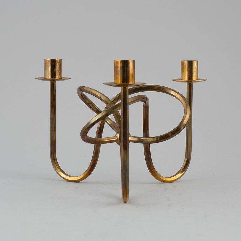 JOSEF FRANK, a brass candelabra, Firma Svenskt Tenn.