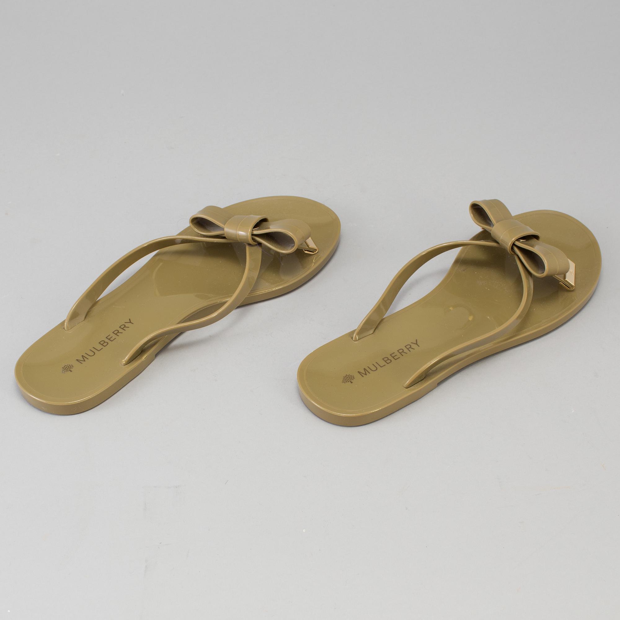 A pair of plastic Mulberry flip flops size 38. Bukowskis