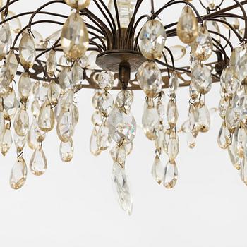 A gustavian style chandelier from the first half of the 20th century.