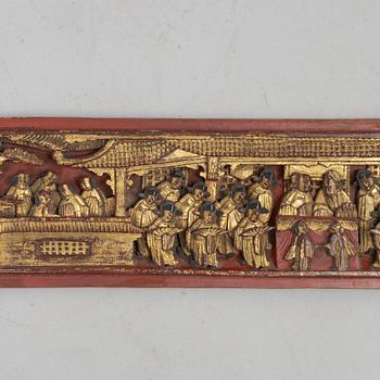 A group of three Chinese wooden panels, late Qing dynasty / around 1900.