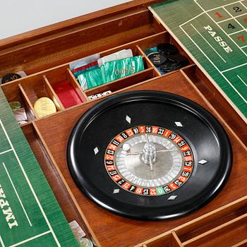 A gaming table and two chairs from Italy, 1950s.
